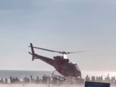 Homem resgatado de helicóptero após sofrer convulsão na Praia da Barra