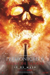 Cartaz do filme Premonição 6: Laços de Sangue com explosão em forma de caveira e torre em chamas. Em cartaz no Cinemark Niterói.