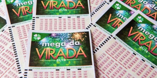 Volantes oficiais das Loterias Caixa em destaque para quem busca saber quanto é o prêmio da Mega da Virada em 2025.
