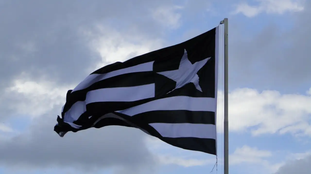 Imagem da bandeira do Botafogo sendo exibida Imagem da bandeira do Botafogo sendo exibida