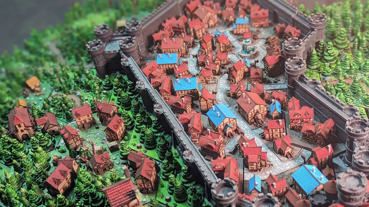 Cidade medieval impressa em 3D com muralhas, casas e florestas Cidade medieval impressa em 3D com muralhas, casas e florestas