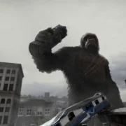 Kong aparece diante de uma cidade destruída em Kong Survivor Instinct