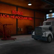 Caminhão cinza estacionado na garagem Bisbee Truck Headquarters, em cena do jogo de realidade virtual Arizona Truck Driver.