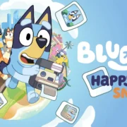 Bluey e Bingo exploram cenário colorido em Bluey's Happy Snaps, jogo de aventura fotográfica com dublagem em português brasileiro.