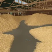 Gameplay de Hay! One Billion! mostra personagens usando equipamentos para remover palha dentro de um celeiro.